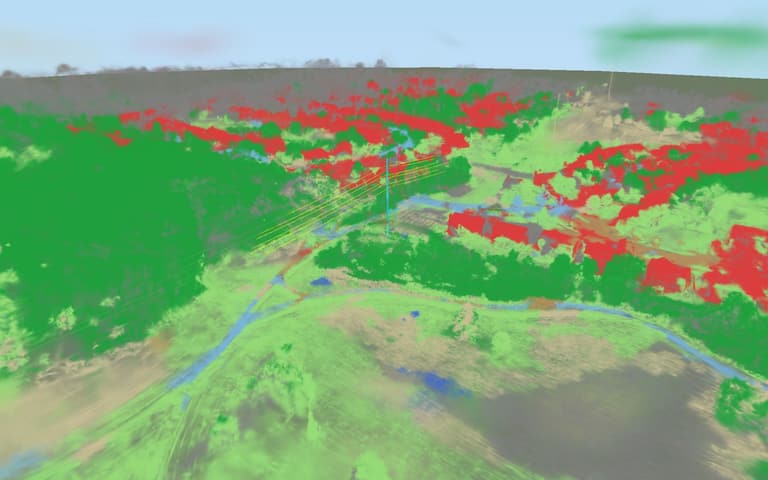 The same corridor model in its classified view, with buildings, trees, grass and paths each shown in their own colour